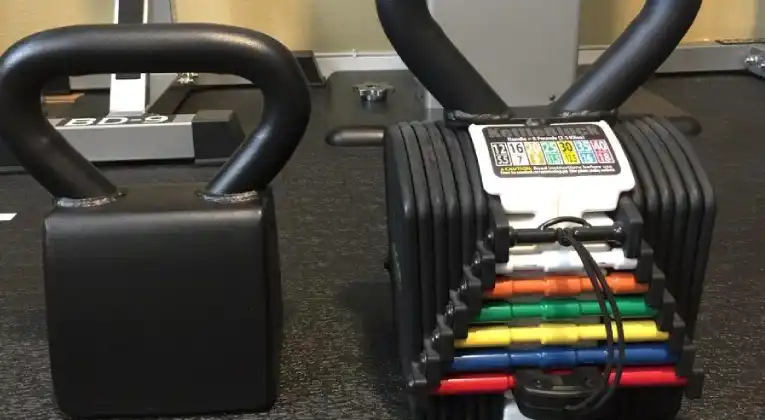 comparison of a powerblock adjustable kettlebell with other kettlebells.