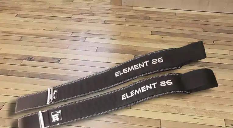 Checking the design and width and length of Element 26 Hybrid Leather Weightlifting Belt.