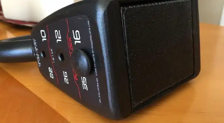 A view of powerblock adjustable kettlebell bottom side from we add and remove weighs.